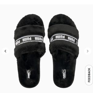 NWT and box Puma slides size 4
